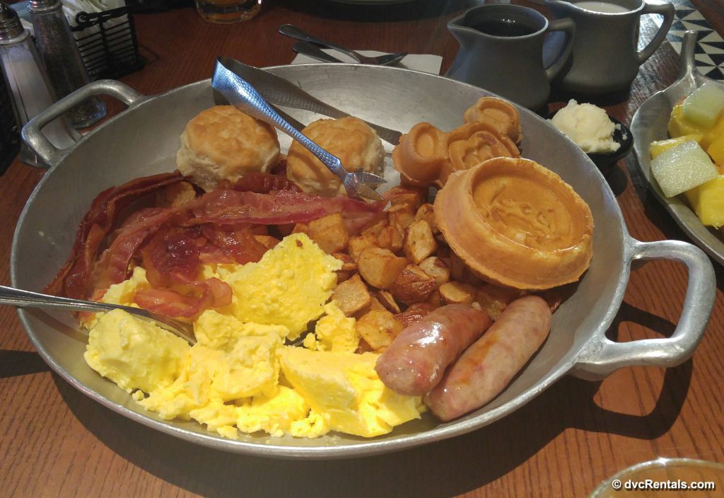 Disney Breakfast Skillet of eggs, bacon, sausage, hash browns and Mickey waffles