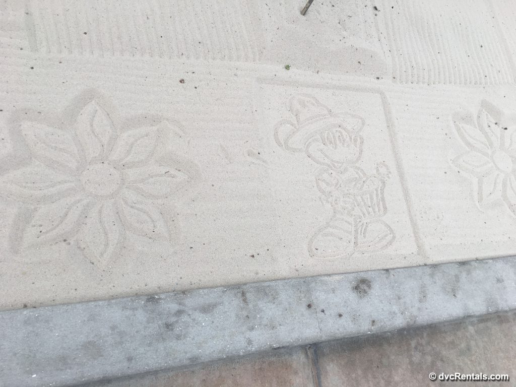 Disney art drawn in sand
