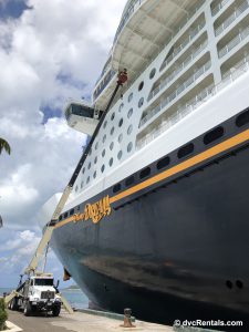 Disney Dream being painted while docked at Nassau, Bahamas