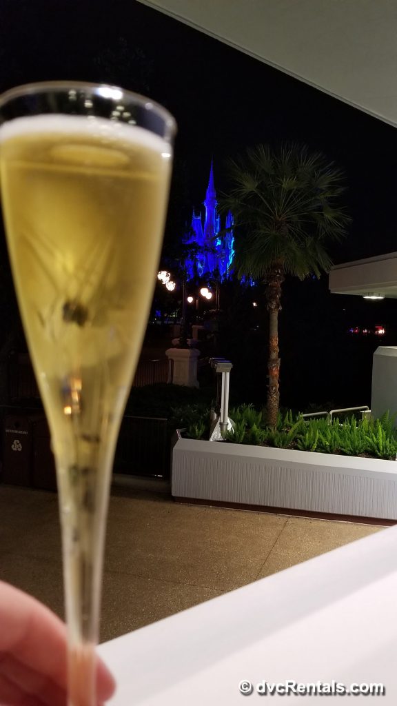 Sparkling apple juice with Cinderella’s castle in the background