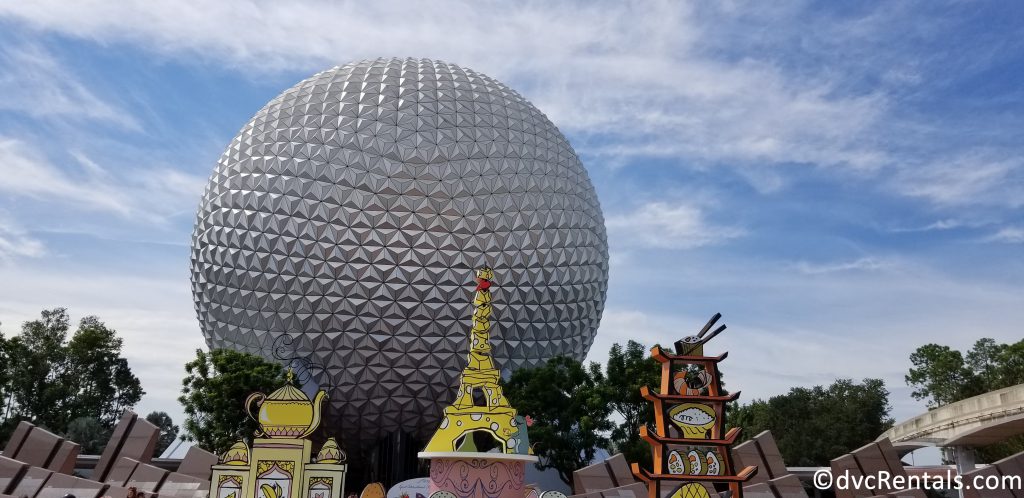 Entrance to Epcot with the International Food & Wine decorations and Geosphere in the background