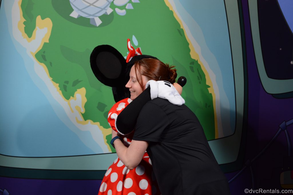  Team Member Kelly hugging Minnie Mouse