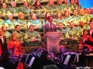 Voice of Liberty member performing in the choir for the Candlelight Processional