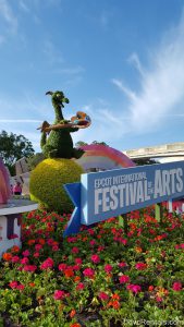 Entrance to Epcot with the Epcot Festival of the Arts signage