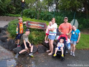 Guest Blogger Kara and her family by the Polynesian sign