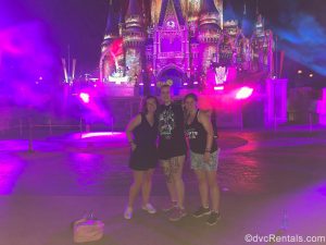 Team Members Melissa, Chelsey and Ashley J. in front of Cinderella Castle