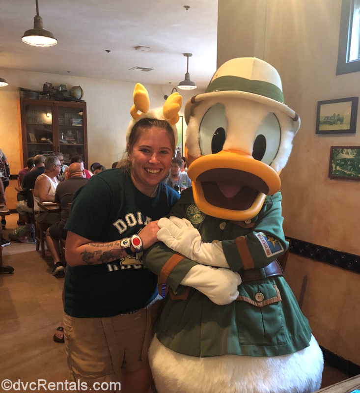 Team Member Ashley J. with Donald Duck at Tusker House in Disney’s Animal Kingdom