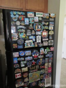 Fridge covered with Disney magnets