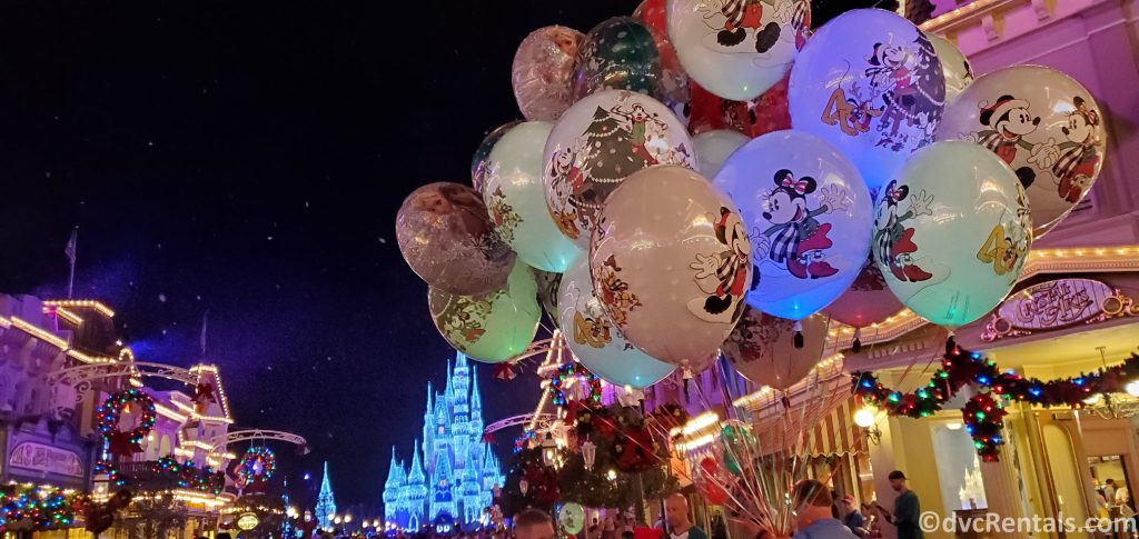 Balloons, Christmas Decorations and Cinderella Castle at the Magic Kingdom