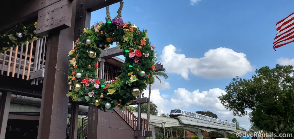 Christmas wreath, monorail and American flag at Disney’s Polynesian Villas and Bungalows