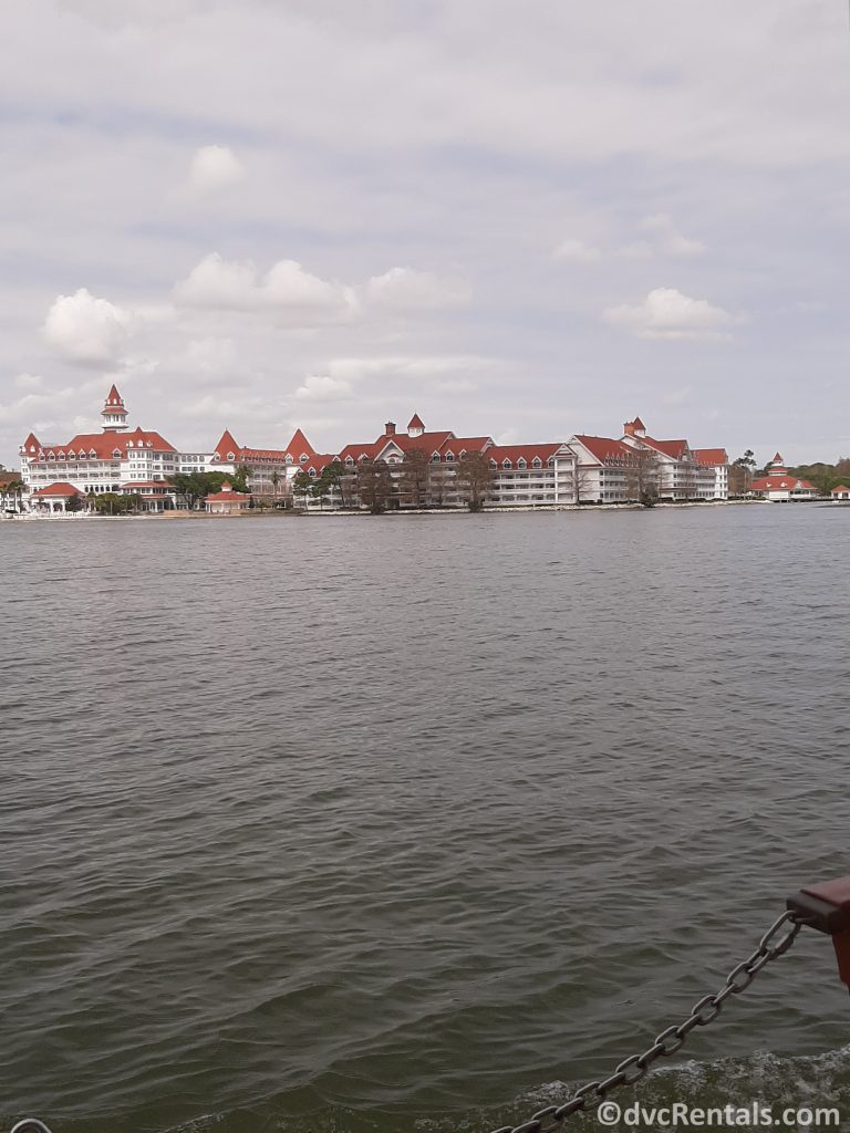 View of the Villas at Disney’s Grand Floridian from a boat on the Seven Seas Lagoon