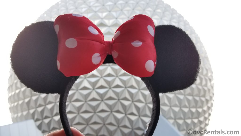 Minnie Mouse Ears in front of the Epcot Geosphere