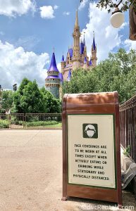 Social Distancing sign with Cinderella Castle in the background