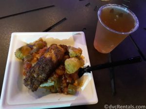food plate and cider from the Taste of EPCOT International Festival of the Holidays