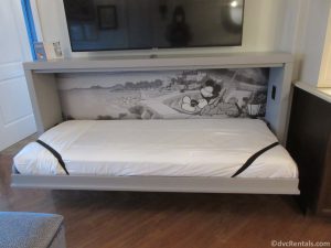 pull down bunk-size bed at Disney’s Rivera Resort with a Mickey Mouse background