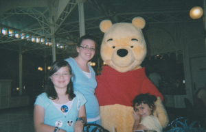 Team Member Alyssa and her family at Disney when she was a child