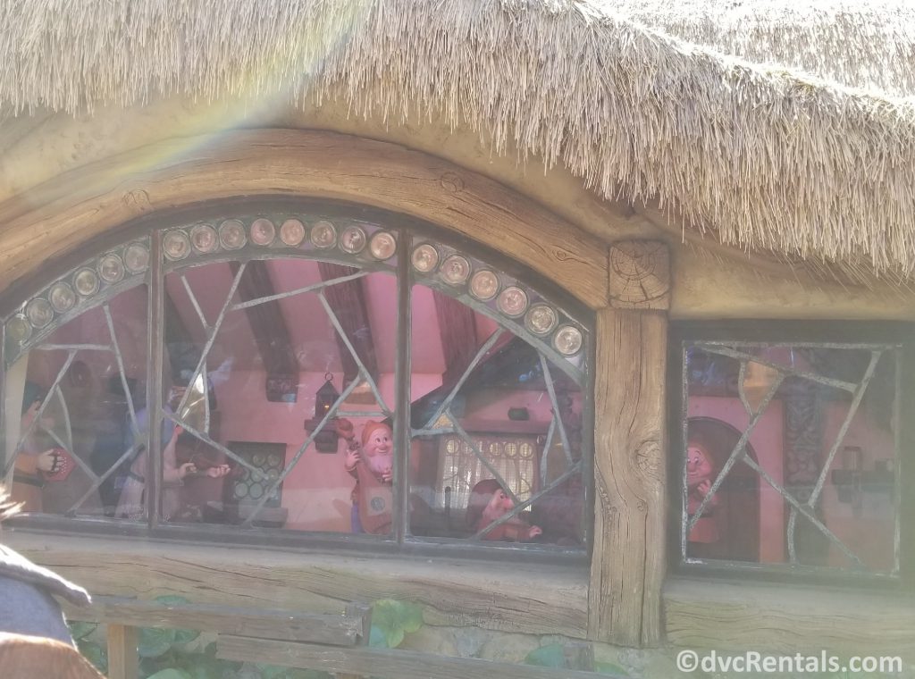 Seven Dwarfs and Snow white in the cottage as part of the Seven Dwarfs Mine Train at Magic Kingdom