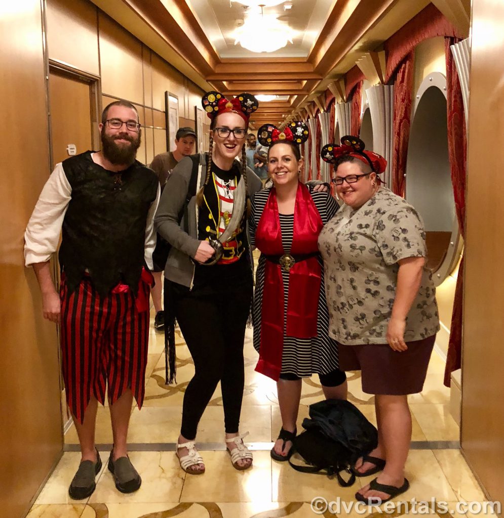 team members Kevin, Chelsey, Stacy and Lindsay dressed as pirates for the Pirate Party on the Disney Dream