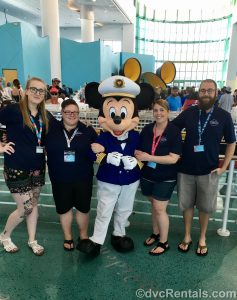 Team Members Chelsey, Lindsay, Stacy, and Kevin with Mickey Mouse at the Port Canaveral cruise terminal