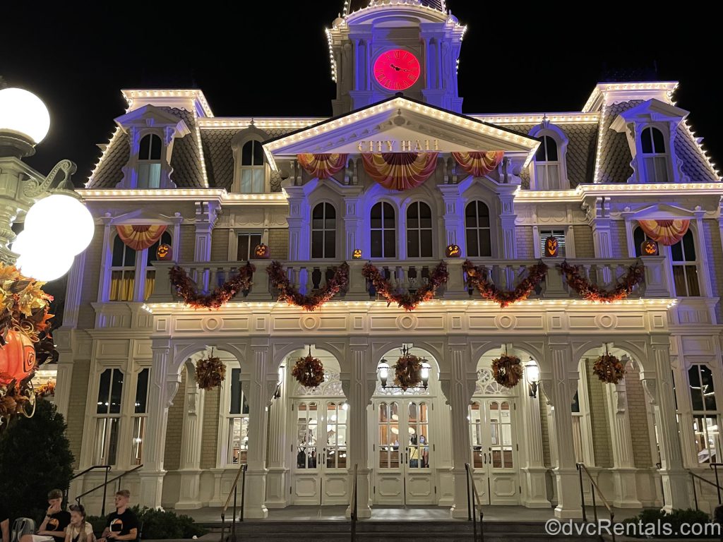 Magic Kingdom’s City Hall with Halloween-themed decorations
