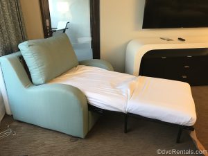 Sleeper chair in a 2 bedroom villa at Disney’s Bay Lake Tower