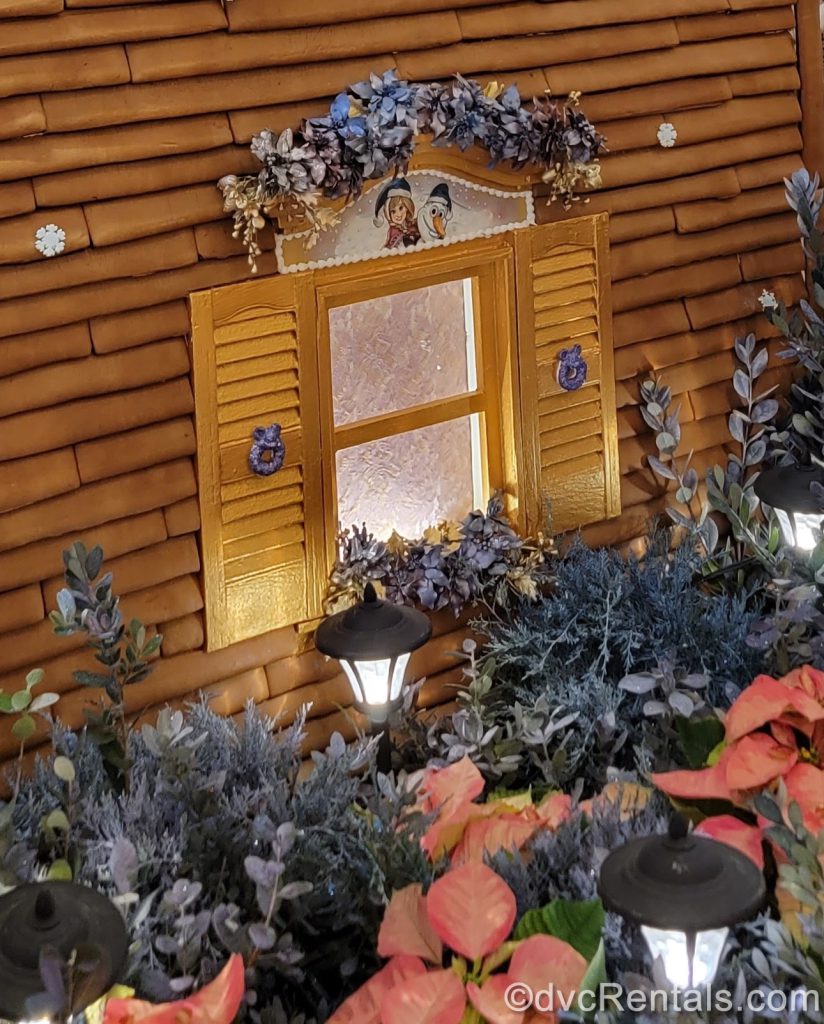 Disney characters above the windowpanes in the Gingerbread house at Disney’s Grand Floridian