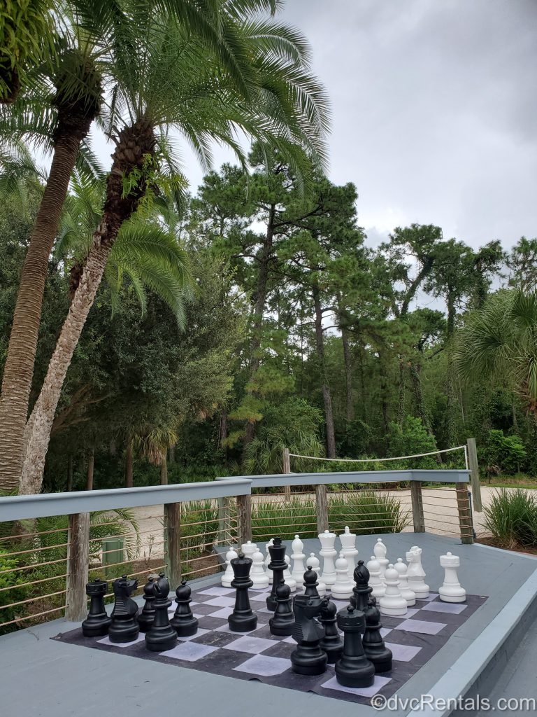 chess board and volleyball court in the background at Disney’s Old Key West