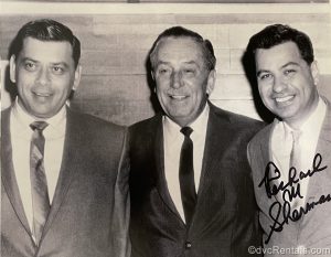 Photo of the Sherman Brothers and Walt Disney
