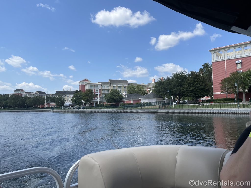 view of Disney’s Boardwalk Villas from a pontoon boat