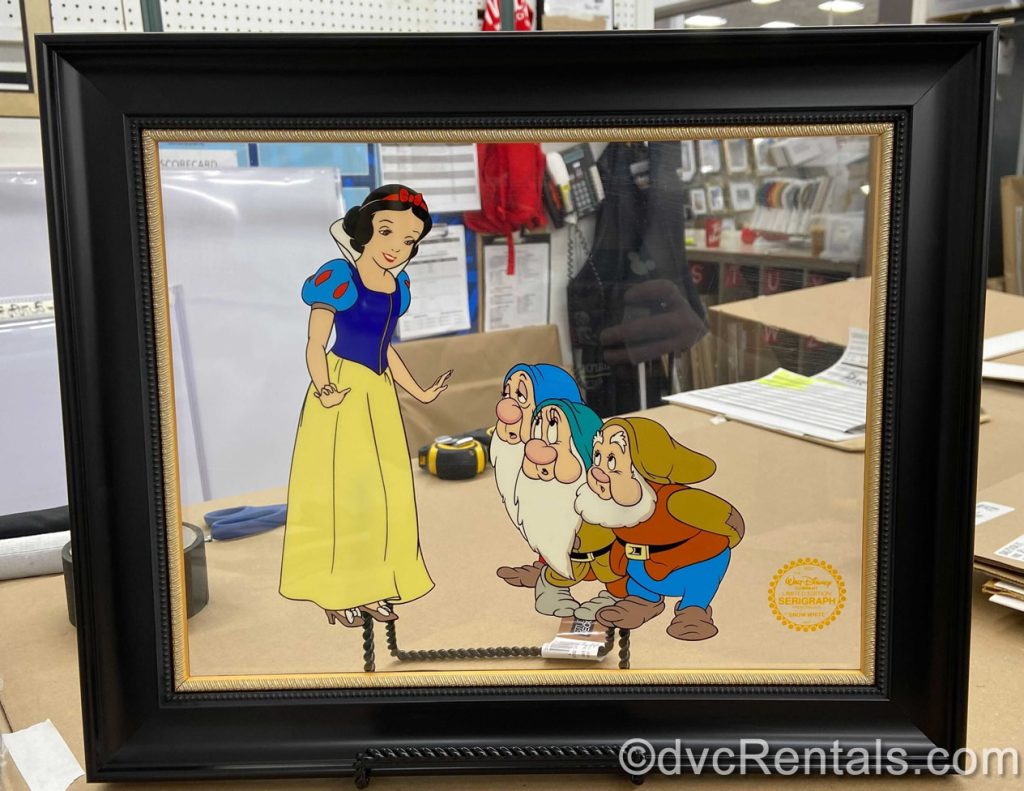 A photo of Snow White custom framing Cassandra has done