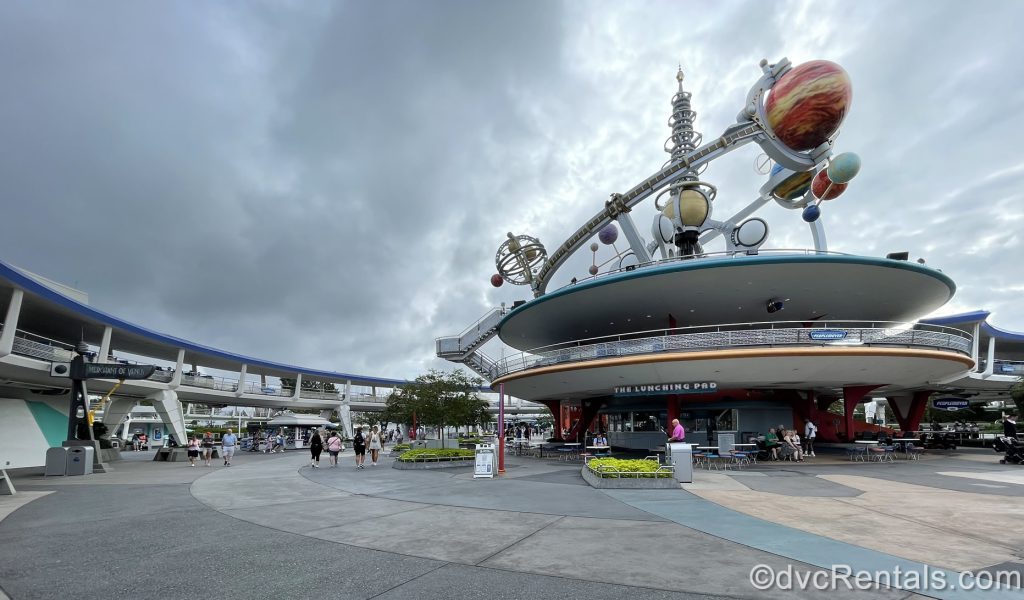 landscape shot of Tomorrowland at the Magic Kingdom with the AstroOrbiter in the distance