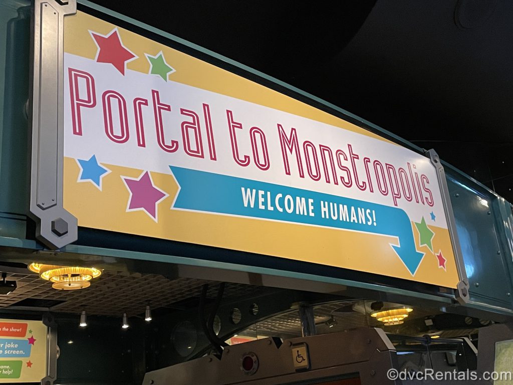 Sign for the portal to Monstropolis at the Monsters Inc Laugh Floor