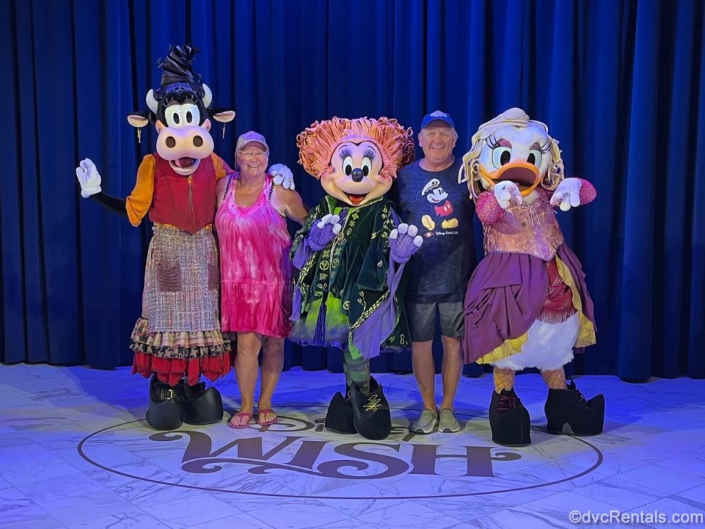 Debbie and her partner Doug meeting Minnie, Daisy, and Clarabelle