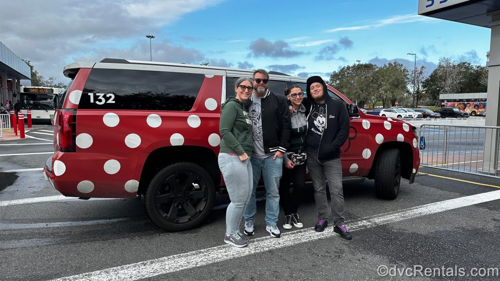 Jennifer and her family in front of a Minnie Van