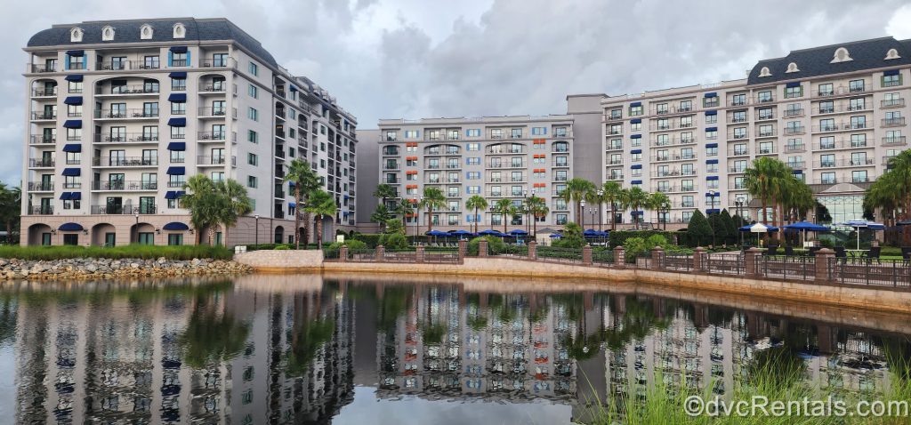 Exterior of Disney's Riviera Resort in front of the Lake with the Reflection of the Building in the Water