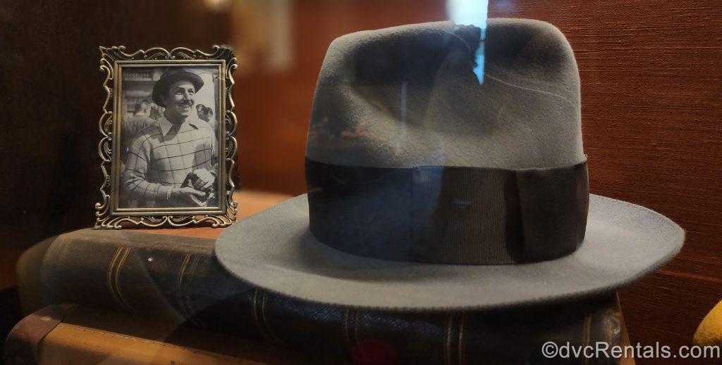 Walt's Hat on Display with a Photo of Walt sitting on a Book