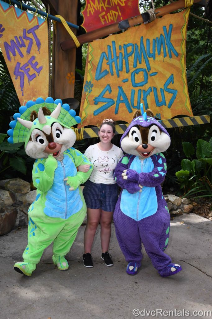 Taycee with Chip and Dale dressed as Dinosaurs
