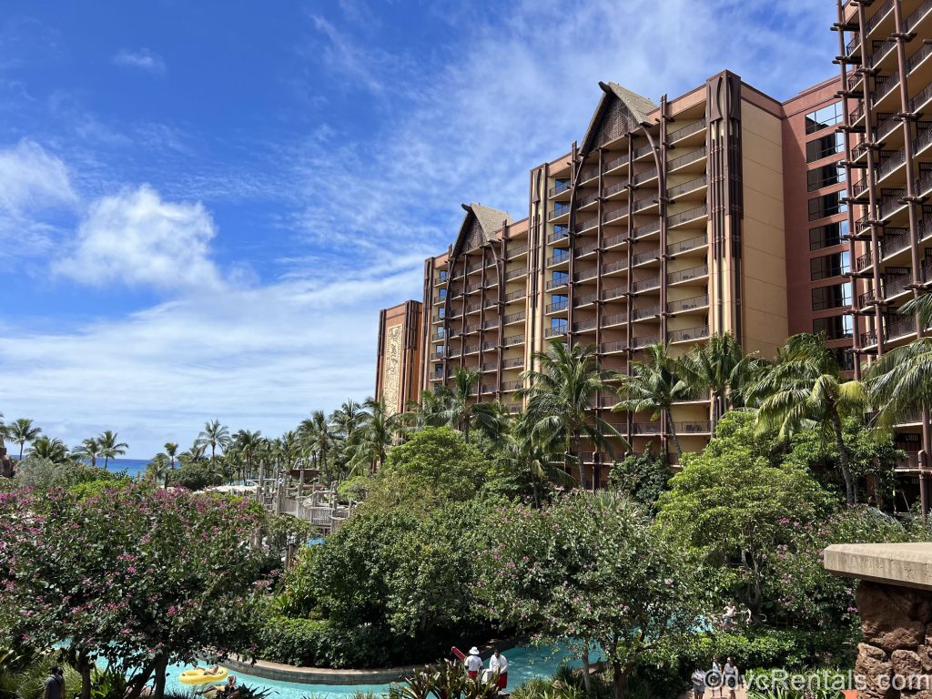Exterior Shot of Aulani with Trees and a Bright Blue Sky