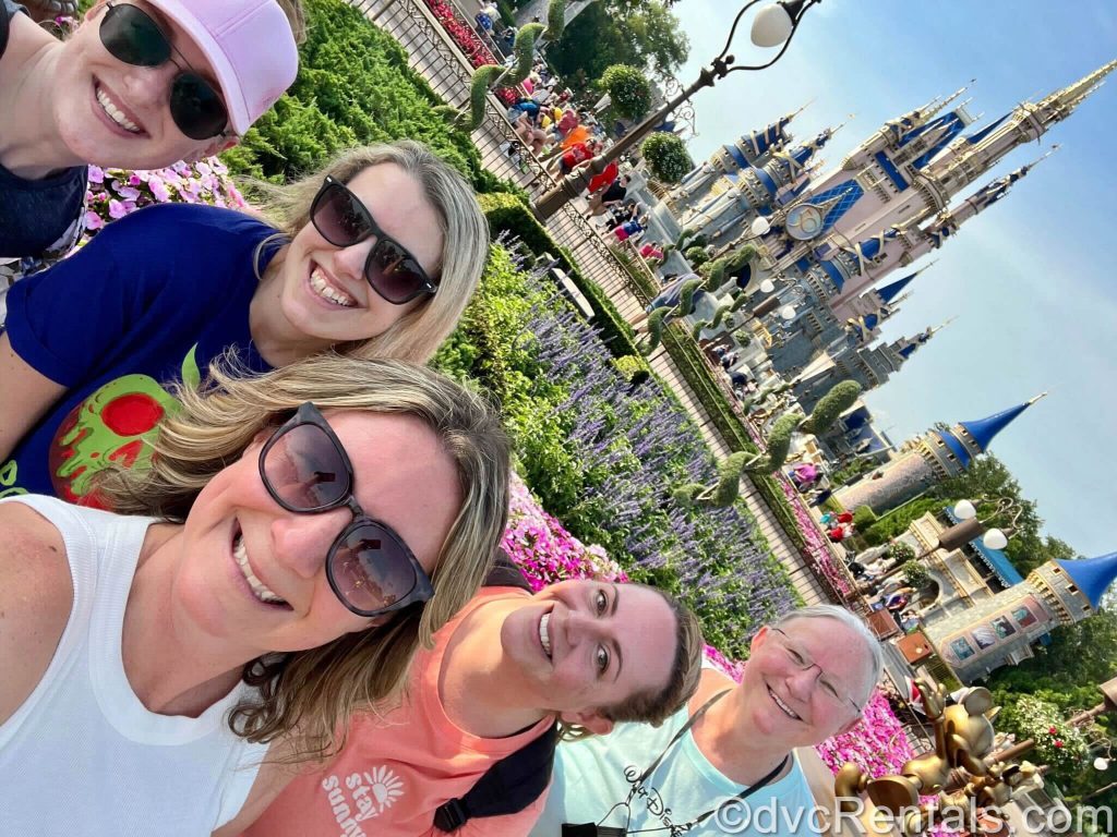 Stacy with team members Chelsey, Debbie, Stephanie, and Melissa at Magic Kingdom.