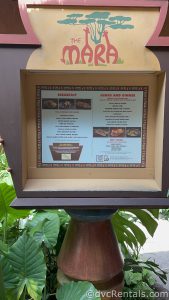 The Mara Menu Board displaying breakfast, lunch, and dinner options on a wooden display.