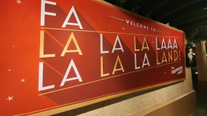Red Sign that reads "Welcome to Fa La La Land."