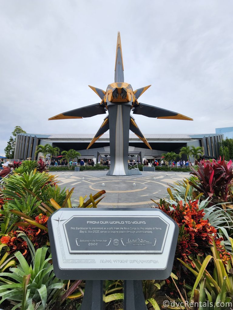 Spaceship outside Guardians of the Galaxy: Cosmic Rewind with a plaque explaining the ship in front.