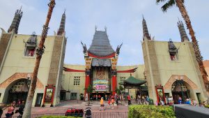 Exterior of the Chinese Theater in Disney's Hollywood Studios. People are walking in front of the building.