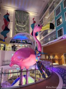 A flamingo statue onboard the Icon of the Seas