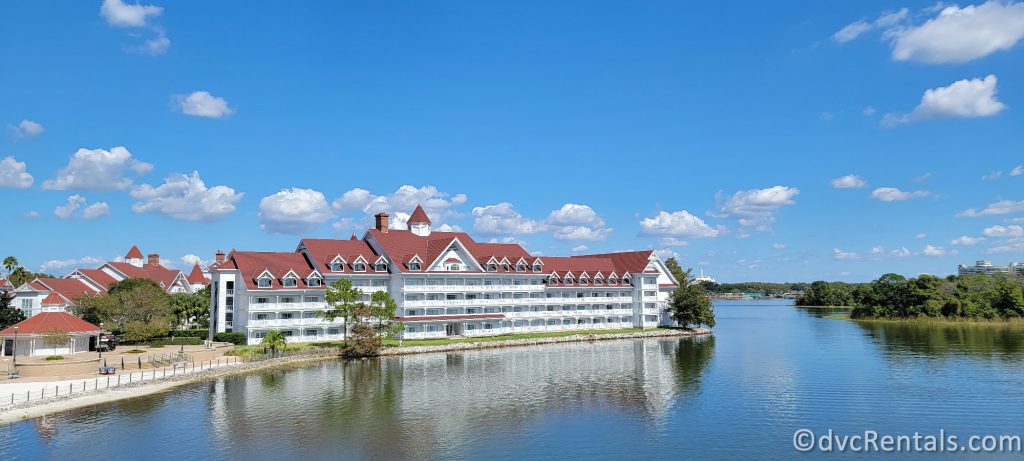 Exterior Shot of Disney's Grand Floridian Resort with the lake in front of it.