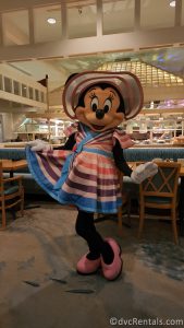 Minnie Mouse posing in Cape May Cafe at Disney's Beach Club Villas.
