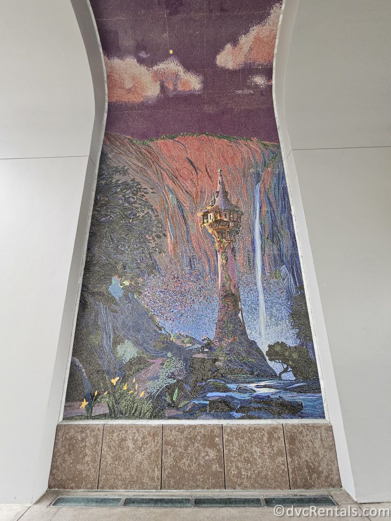 Mural of Rapunzel's Tower in the walkway to the Skyliner from Disney's Riviera Resort.