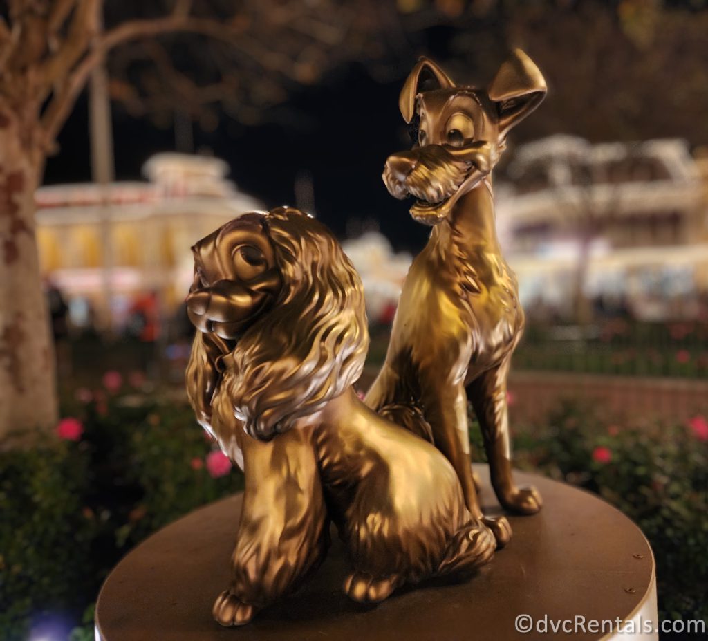 50th Anniversary Gold Statue of Lady and the Tramp on Main Street U.S.A. in Magic Kingdom.