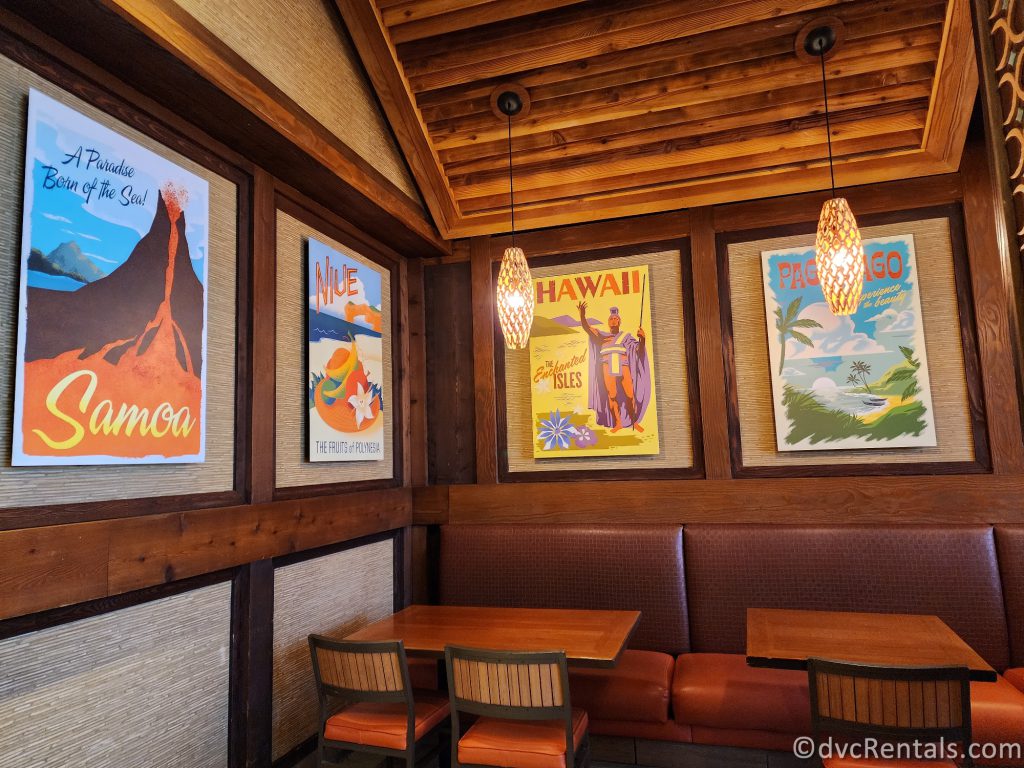 Colorful Graphic Prints of the Polynesian islands on the walls in Capt. Cook's.