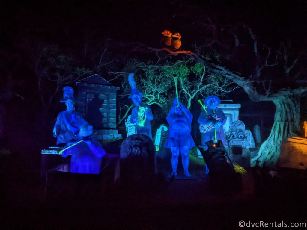 The Ghost Band inside the Gim Grinning Ghosts cemetery on the Haunted Mansion.